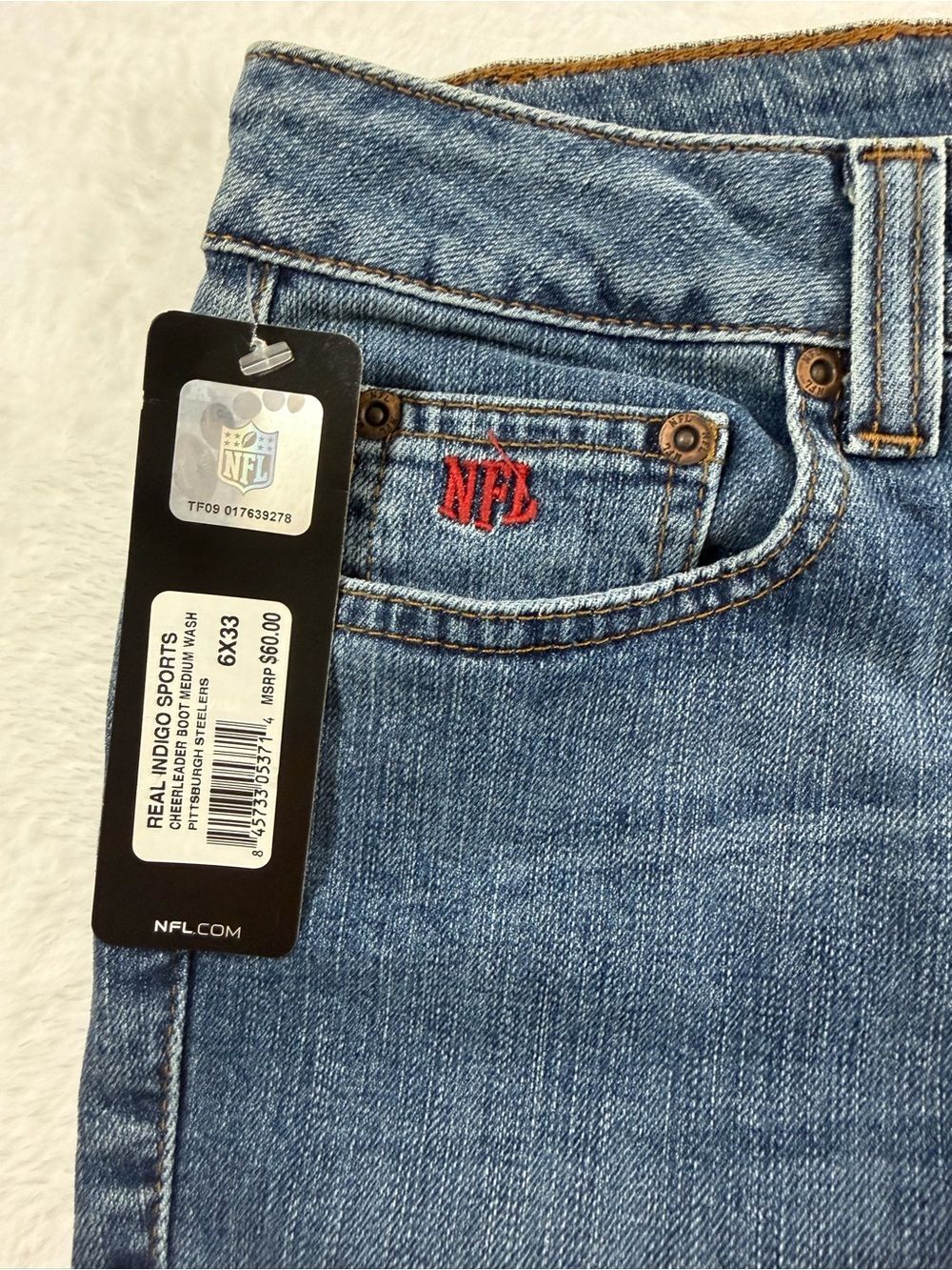 NFL Women’s Light Blue Denim Jeans with Red Logo